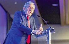 Gordon Brown (left), Former British Prime Minister, addressing the audience