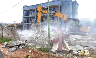 One of the structures being demolished during the operation