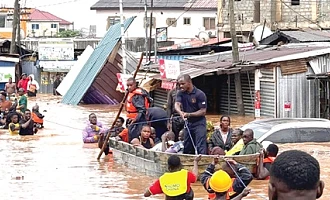 Some officials of NADMO and the 48 Engineer Regiment of the Ghana Armed Forces, on rescue operation in flood-affected areas