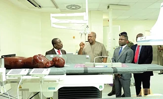President John Dramani Mahama in a chat with Dr Kow Entsua-Mensah (left), Director of National Cardiothoracic Centre. With them include Kwabena Mintah Akandoh (right), Minister of Health  