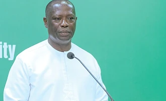 Emmanuel Armah-Kofi Buah, Minister of Lands and Natural Resources, addressing the press in Accra