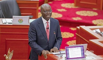 Dr Cassiel Ato Forson,  Minister of Finance,  presenting the Mid-Year Fiscal Policy Review in Parliament