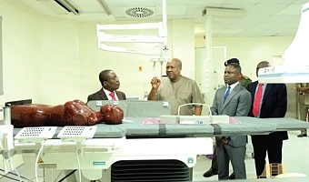 President John Dramani Mahama in a chat with Dr Kow Entsua-Mensah (left), Director of National Cardiothoracic Centre. With them include Kwabena Mintah Akandoh (right), Minister of Health  