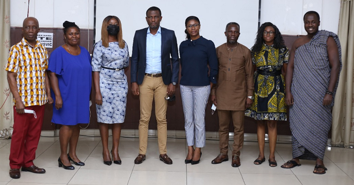 The CEO of Global Signature, Mr Emmanuel Treku (3rd right) with the Deputy Minister of Tourism Arts and Culture, Mark Okraku Mantey (5th right) in a group photo with some guests and officials of the Tourism Ministry at the press soiree 