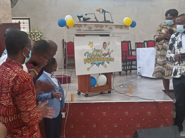 Master Uriel Prince Boateng Aryeetey with some dignitaries at the launch of the Uriel Foundation admiring the logo for the Foundation Master Uriel Prince Boateng Aryeetey with some dignitaries at the launch of the Uriel Foundation admiring the logo for the Foundation